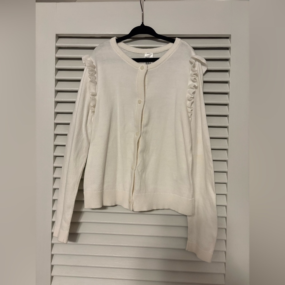 Girl’s White Ruffle Cardigan